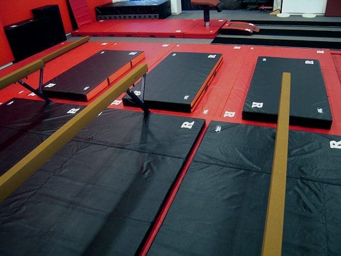 Rutgers logo on new gym mats